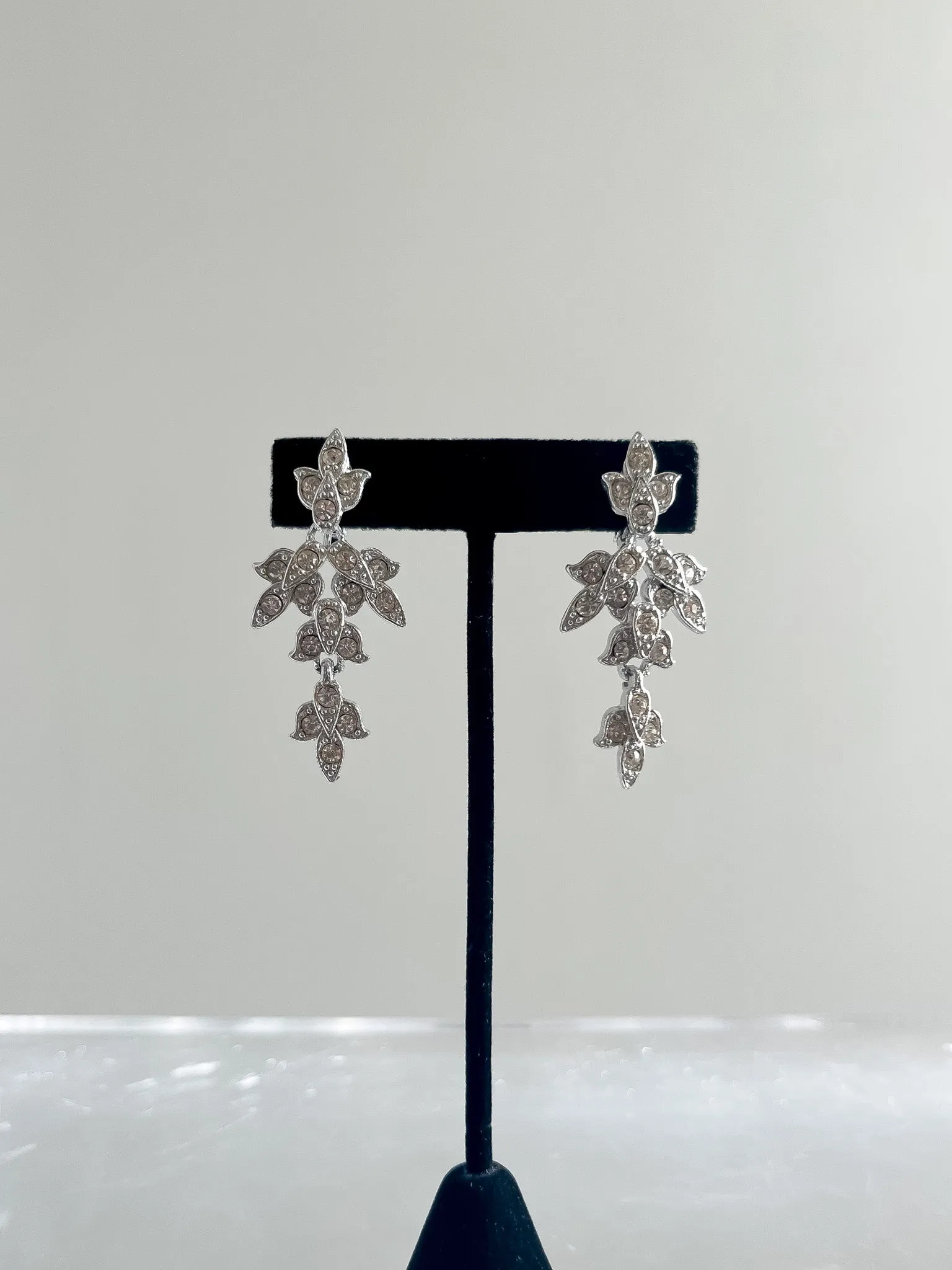 1950's Sarah Coventry Siver Rhinestone Leaf Clip-on Earrings